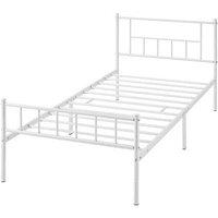 Bračni metalni krevet na platformi s vretenastim uzglavljem i podnožjem, bijeli