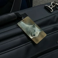 Kartica za prtljagu s bijelim vukom u drvetu, Identifikacijska oznaka za ručnu prtljagu na koferu